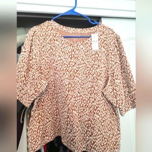 Pumpkin and white animal print blouse